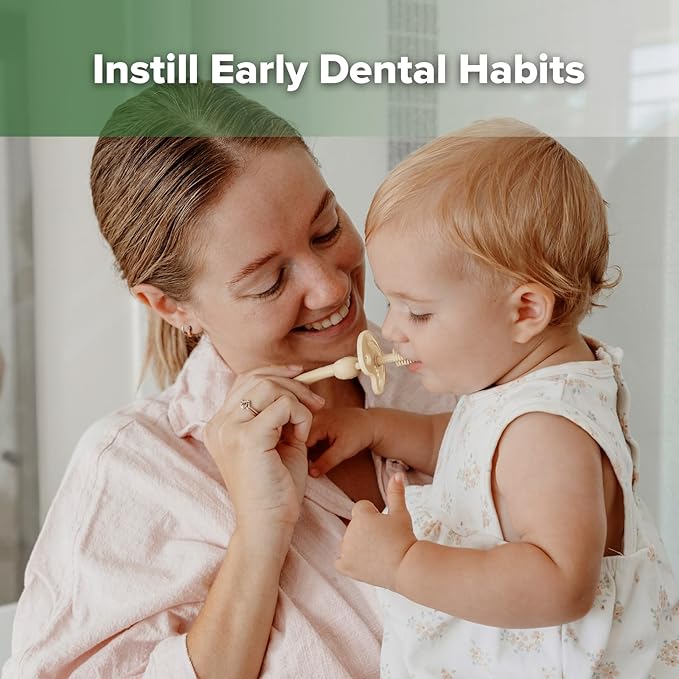 haakaa 360° Baby Toothbrush with Suction Base - Gentle Cleaning for Infant Self-Brushing Training, Food-Grade Silicone, Adjustable Safety Shield - Cream (1 Piece)